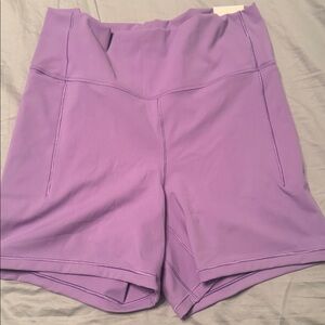 Inspire High-Rise Purple Bike Shorts by Calia